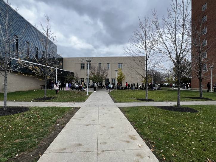 Attendees wait to pick up their turkeys in 2024 at Care Alliance Health Care facility in the Central neighborhood.